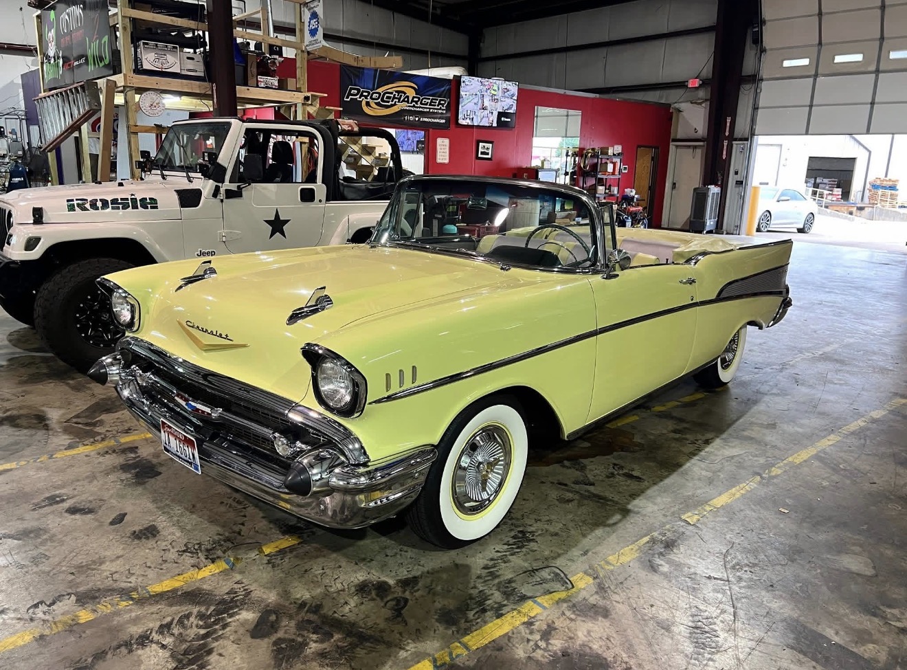 Yellow 1957 Chevrolet Bel Air convertible restored at Insanity Customs in Tulsa